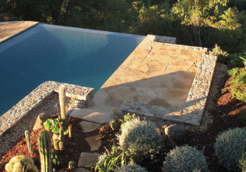 Are there any special considerations i need to make when building an infinity or lap-style swimming pool?