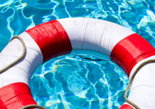 What kind of safety equipment should i consider when having a swimming pool built?